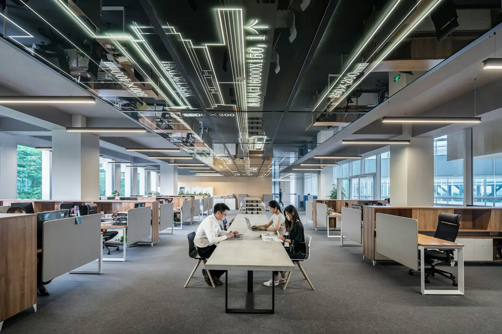 Open-plan office with a working team